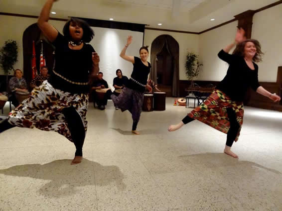 From the left, Noelle Lawrence, Virginia Comfort, and Meg Dennis performing traditional dances. 